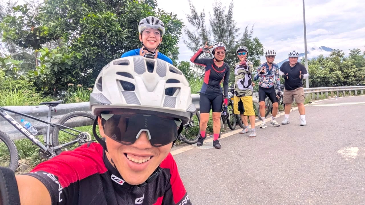 A tourist guide taking a selfie during bike tour