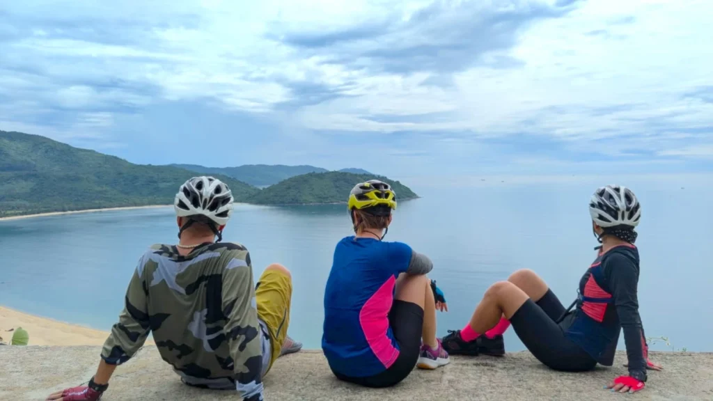 Relaxing moments for cyclists at the top of Hai Van Pass