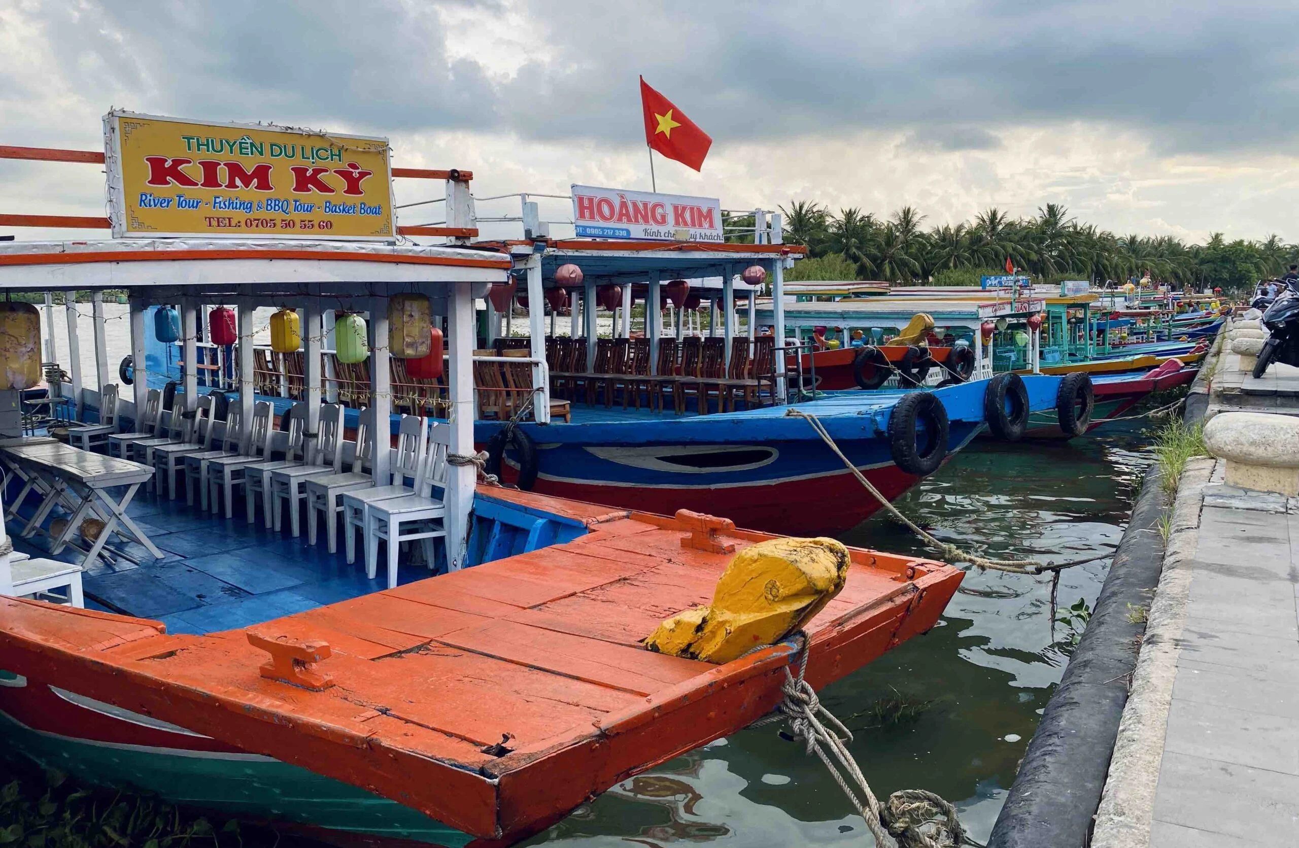 Sunset boats in Thu Bon River