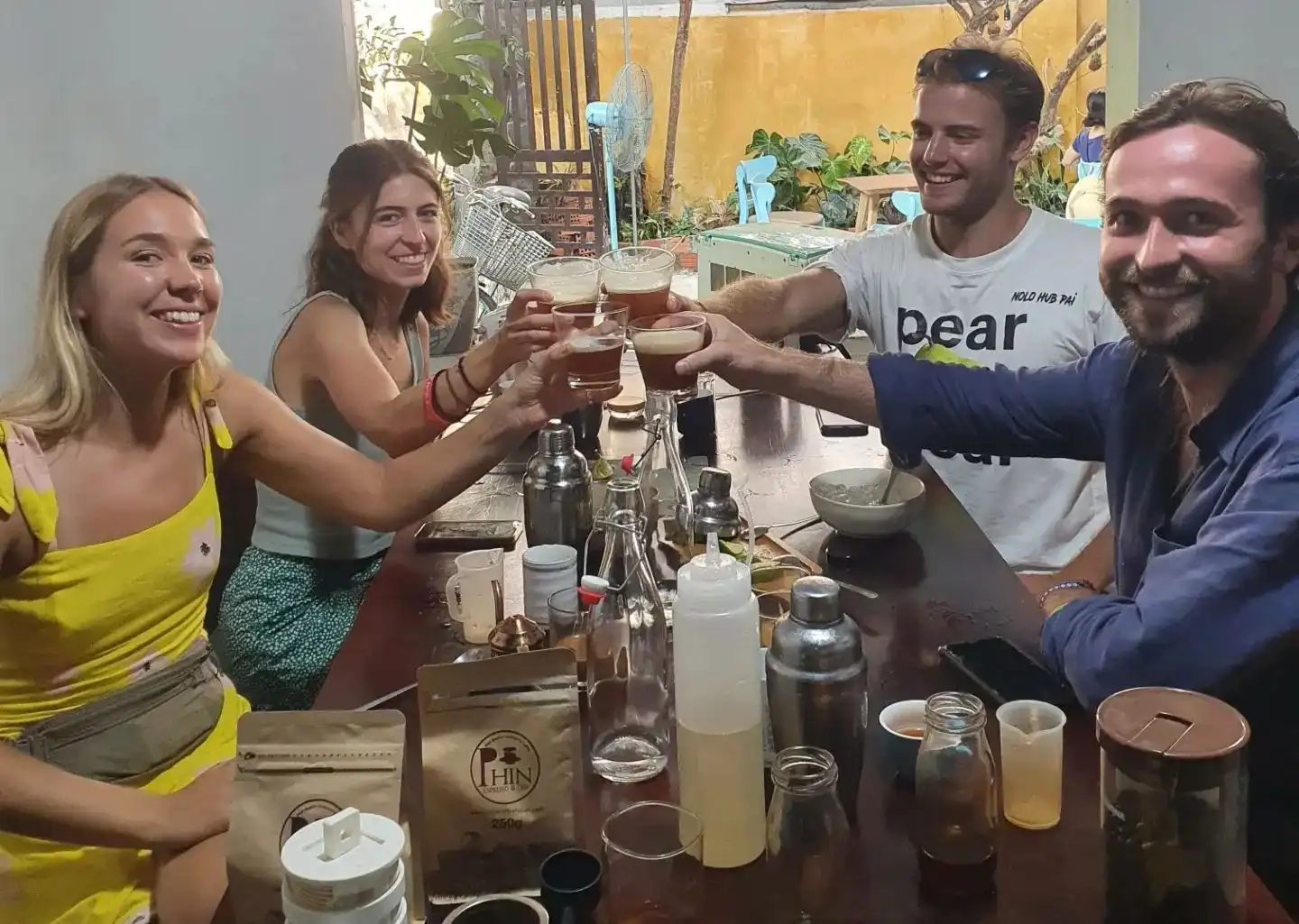 Tourists cheering cold brew coffee at Phin Coffee Resturant