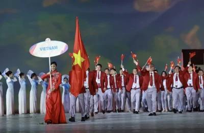 A representative lady holding Vietnam name flag at SEA Games