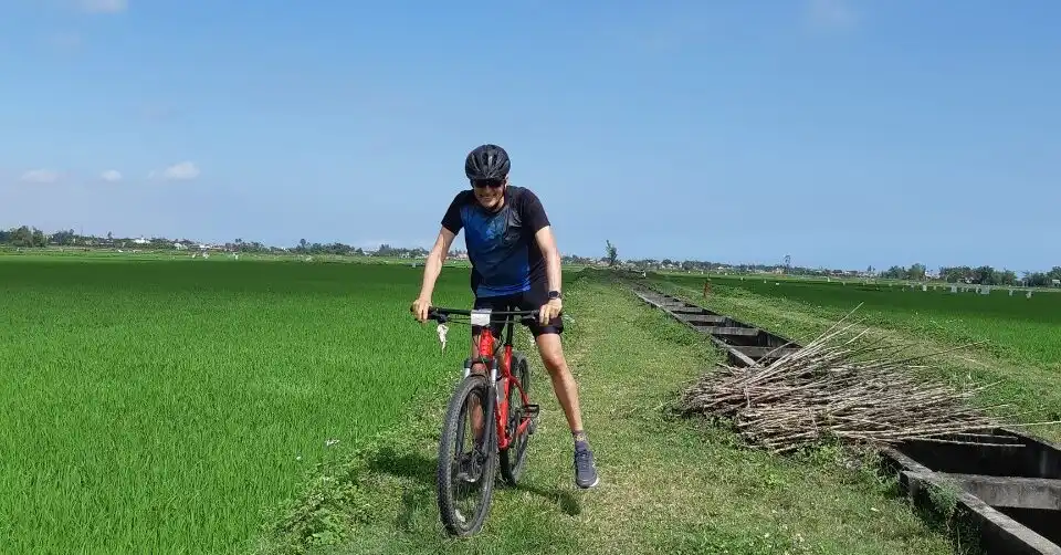 Bike trip in countryside rice field