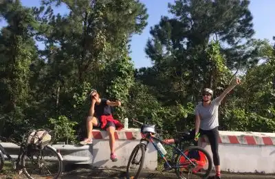 Two biking tourists on the road of Vietnam