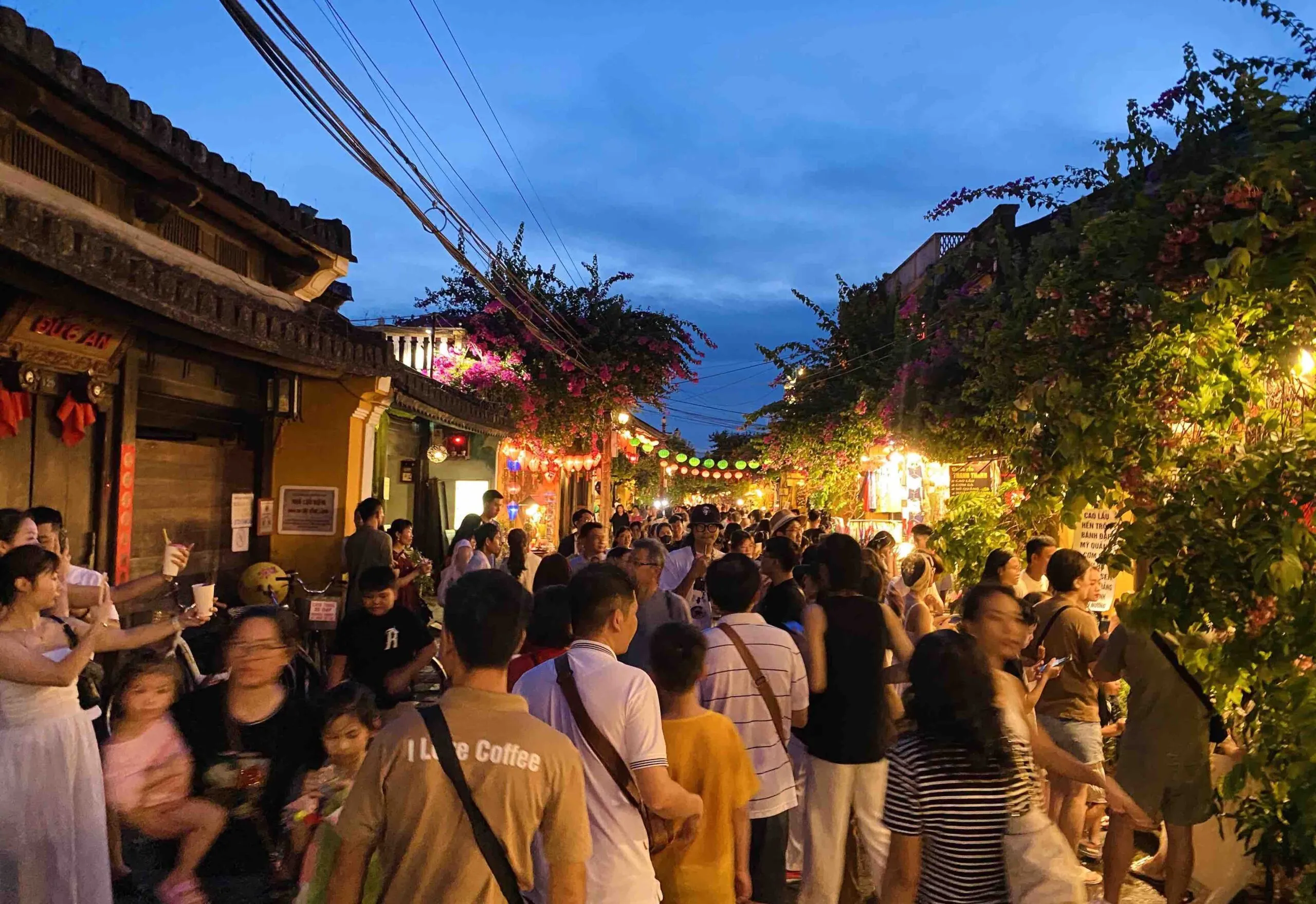 Tourists enjoying the evening of Hoi An Old Town